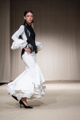 July 25, 2026, Madrid, Spain: A model walks the runway wearing a design by Flamentex during the Momad Fashion Week de Madrid in IFEMA. Madrid Spain  - ZUMAs197 20260725_aaa_s197_079 Copyright: xAtilanoxGarciax