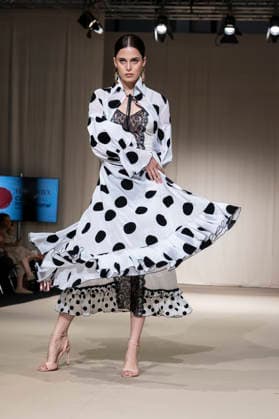 July 25, 2026, Madrid, Spain: A model walks the runway wearing a design by Flamentex during the Momad Fashion Week de Madrid in IFEMA. Madrid Spain  - ZUMAs197 20260725_aaa_s197_085 Copyright: xAtilanoxGarciax