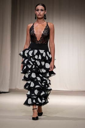 July 25, 2026, Madrid, Spain: A model walks the runway wearing a design by Flamentex during the Momad Fashion Week de Madrid in IFEMA. Madrid Spain  - ZUMAs197 20260725_aaa_s197_086 Copyright: xAtilanoxGarciax