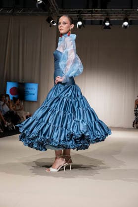 July 25, 2026, Madrid, Spain: A model walks the runway wearing a design by Flamentex during the Momad Fashion Week de Madrid in IFEMA. Madrid Spain  - ZUMAs197 20260725_aaa_s197_098 Copyright: xAtilanoxGarciax