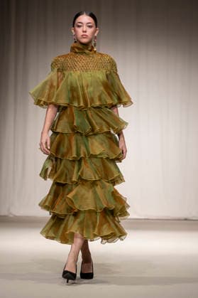 July 25, 2026, Madrid, Spain: A model walks the runway wearing a design by Flamentex during the Momad Fashion Week de Madrid in IFEMA. Madrid Spain  - ZUMAs197 20260725_aaa_s197_104 Copyright: xAtilanoxGarciax