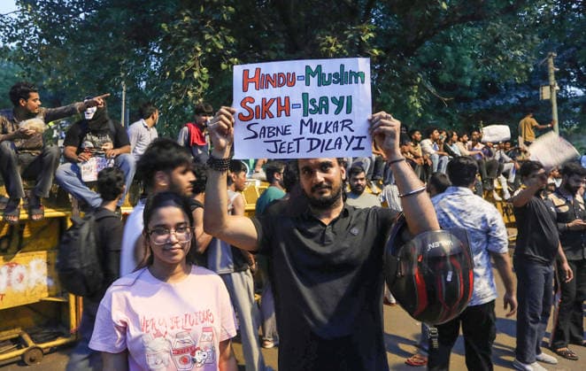 CJP supporters at the protest site following the resignation of Union Education Minister Dharmendra Pradhan New Delhi, Jul 25 (ANI): A CJP supporter holds a placard at the protest site following the resignation of Union Education Minister Dharmendra Pradhan, in New Delhi on Saturday. New Delhi Delhi India Copyright: xANIx ANI_20260725471