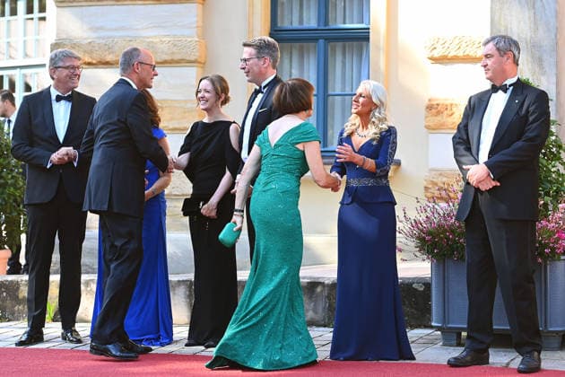 v.li:Wolfram WEIMER,Bundeskanzler Friedrich MERZ,Markus BLUME (CSU,Bayerischer Staatsminister für Wissenschaft und Kunst),Charlotte MERZ,,Karin BAUMUELLER SOEDER, Markus SOEDER (Ministerpraesident Bayern und CSU Vorsitzender), Eroeffnung der Bayreuther Richard Wagner Festspiele 2026, Roter Teppich am 25.07.2026. Gruener Huegel, *** From left: Wolfram WEIMER, Federal Chancellor Friedrich MERZ, Markus BLUME (CSU), Bavarian Minister of State for Science and the Arts, Charlotte MERZ, Karin BAUMUELLER SOEDER, Markus SOEDER, Minister-President of Bavaria and CSU Chairman, Opening of the 2026 Bayreuth Richard Wagner Festival, Red Carpet on July 25, 2026, at the Green Hill,