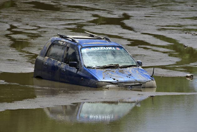 Aftermath of the flood in India s Sivasagar SIVASAGAR,INDIA-JULY 25: Vehicle swept away by floodwaters remains partially submerged in muddy water in Sivasagar, Assam, India, on Saturday, July 25, 2026. Hafiz Ahmed Anadolu Sivasagar India. Editorial use only. Please get in touch for any other usage.  Copyright: x2026xAnadoluxHafizxAhmedx