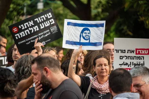July 25, 2026, Tel Aviv, Israel: TEL AVIV, ISRAEL Ã¢â‚¬ JULY 24, 2026: Left-wing activists protest near IDF headquarters in Tel Aviv against settler violence in the West Bank, days after clashes left two Israelis and four Palestinians dead. Police declared the protest unauthorized after demonstrators blocked a road, arresting eight people. Tel Aviv Israel - ZUMAq101 20260725_zna_q101_211 Copyright: xJessxFlomx
