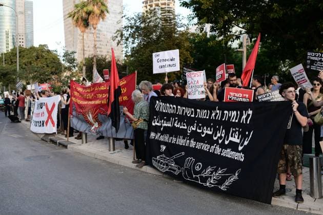 July 25, 2026, Tel-Aviv, Israel: TEL AVIV, ISRAEL Ã¢â‚¬ JULY 25, 2026: Dozens of protesters gather outside Israeli military headquarters (Kirya) in Tel Aviv to demonstrate against ongoing settler violence targeting Palestinians in the occupied West Bank. Clashes broke out with police after some demonstrators attempted to block the road. Tel-Aviv Israel - ZUMAq101 20260725_zna_q101_265 Copyright: xTomerxNeubergx