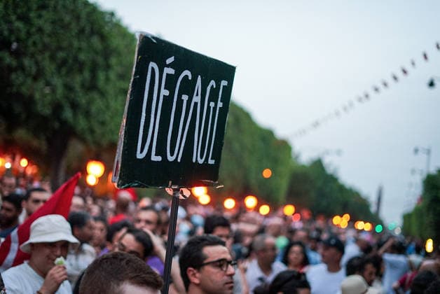 July 25, 2026, Tunis, Tunis, Tunisia, Tunisia: People hold placards and chant slogans during a protest against Tunisian President Kais Saied in downtown Tunis, Tunisia, on July 25, 2026. Demonstrators gathered on Republic Day to denounce the government s handling of prolonged power outages and recurring water cuts affecting regions across the country, while also criticizing President Saied s rule and demanding political and economic reforms. Tunis Tunisia  - ZUMAm342 20260725_zsp_m342_028 Copyright: xHasanxMradx