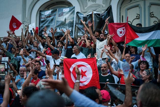 July 25, 2026, Tunis, Tunis, Tunisia, Tunisia: People hold placards and chant slogans during a protest against Tunisian President Kais Saied in downtown Tunis, Tunisia, on July 25, 2026. Demonstrators gathered on Republic Day to denounce the government s handling of prolonged power outages and recurring water cuts affecting regions across the country, while also criticizing President Saied s rule and demanding political and economic reforms. Tunis Tunisia - ZUMAm342 20260725_zsp_m342_027 Copyright: xHasanxMradx