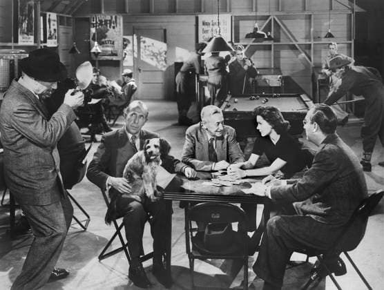 Charles Butterworth (with dog), Ramsay Ames, on-set of the Film, Follow the Boys , Universal Pictures, 1944  Copyright: xABxArchivesx jtv014151