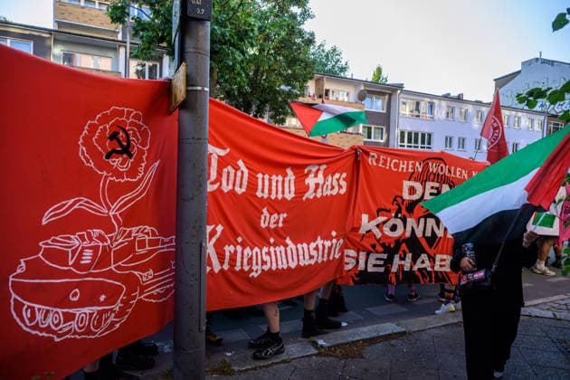 July 25, 2026, Berlin, Berlin, Germany: Anti war banners, the left writes Death and Hate at the war industry at the Internationalist Queer Pride on July 25 2026 in Berlin Germany. Thousands of people marched in Wedding district of Berlin to protest against queerophobia and for equallity, as well as against imperialism and the genocidal war of Israel in Gaza and the rest of the Palestinian Territories, in the annual Internationalist Queer Pride of 2026 in Berlin. Berlin Germany  - ZUMAk201 20260725_zip_k201_042 Copyright: xNikosxKanistrasx