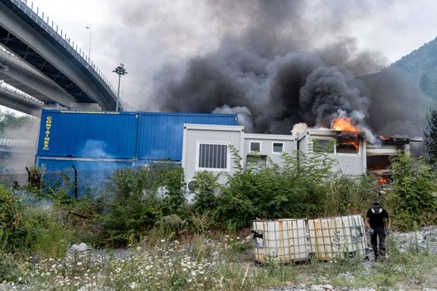 July 25, 2026, Susa, Piedmont, Italy: On July 25, 2026, thousands of people departed from AltaFelicito , a music festival in Venaus, to reach the construction sites of the TAV (High speed rail), a railway project to connect Italy and France. The demonstrators managed to enter the site and there clashed with the police, who responded with tear gas. Many of the buildings inside were put on fire, including two police vehicles. The TAV project has been highly contested during the last 30 years because of environmental damages and increasing costs. Susa Italy  - ZUMAs377 20260725_znp_s377_007 Copyright: xPietroxStariccox