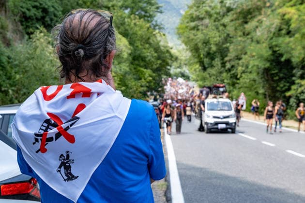 July 25, 2026, Susa, Piedmont, Italy: On July 25, 2026, thousands of people departed from AltaFelicito , a music festival in Venaus, to reach the construction sites of the TAV (High speed rail), a railway project to connect Italy and France. The demonstrators managed to enter the site and there clashed with the police, who responded with tear gas. Many of the buildings inside were put on fire, including two police vehicles. The TAV project has been highly contested during the last 30 years because of environmental damages and increasing costs. Susa Italy  - ZUMAs377 20260725_znp_s377_016 Copyright: xPietroxStariccox