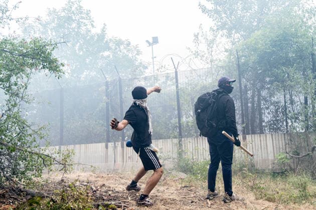July 25, 2026, Susa, Piedmont, Italy: On July 25, 2026, thousands of people departed from AltaFelicito , a music festival in Venaus, to reach the construction sites of the TAV (High speed rail), a railway project to connect Italy and France. The demonstrators managed to enter the site and there clashed with the police, who responded with tear gas. Many of the buildings inside were put on fire, including two police vehicles. The TAV project has been highly contested during the last 30 years because of environmental damages and increasing costs. Susa Italy  - ZUMAs377 20260725_znp_s377_029 Copyright: xPietroxStariccox