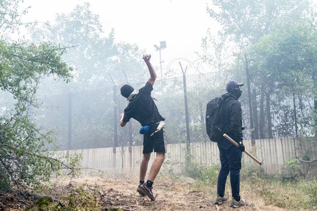 July 25, 2026, Susa, Piedmont, Italy: On July 25, 2026, thousands of people departed from AltaFelicito , a music festival in Venaus, to reach the construction sites of the TAV (High speed rail), a railway project to connect Italy and France. The demonstrators managed to enter the site and there clashed with the police, who responded with tear gas. Many of the buildings inside were put on fire, including two police vehicles. The TAV project has been highly contested during the last 30 years because of environmental damages and increasing costs. Susa Italy  - ZUMAs377 20260725_znp_s377_030 Copyright: xPietroxStariccox