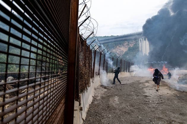 July 25, 2026, Susa, Piedmont, Italy: On July 25, 2026, thousands of people departed from AltaFelicito , a music festival in Venaus, to reach the construction sites of the TAV (High speed rail), a railway project to connect Italy and France. The demonstrators managed to enter the site and there clashed with the police, who responded with tear gas. Many of the buildings inside were put on fire, including two police vehicles. The TAV project has been highly contested during the last 30 years because of environmental damages and increasing costs. Susa Italy  - ZUMAs377 20260725_znp_s377_035 Copyright: xPietroxStariccox