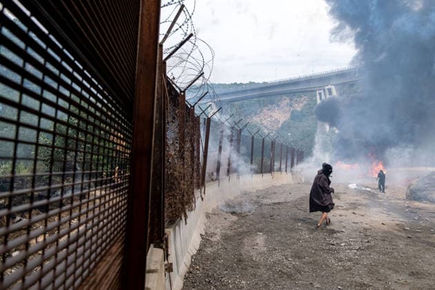July 25, 2026, Susa, Piedmont, Italy: On July 25, 2026, thousands of people departed from AltaFelicito , a music festival in Venaus, to reach the construction sites of the TAV (High speed rail), a railway project to connect Italy and France. The demonstrators managed to enter the site and there clashed with the police, who responded with tear gas. Many of the buildings inside were put on fire, including two police vehicles. The TAV project has been highly contested during the last 30 years because of environmental damages and increasing costs. Susa Italy  - ZUMAs377 20260725_znp_s377_036 Copyright: xPietroxStariccox