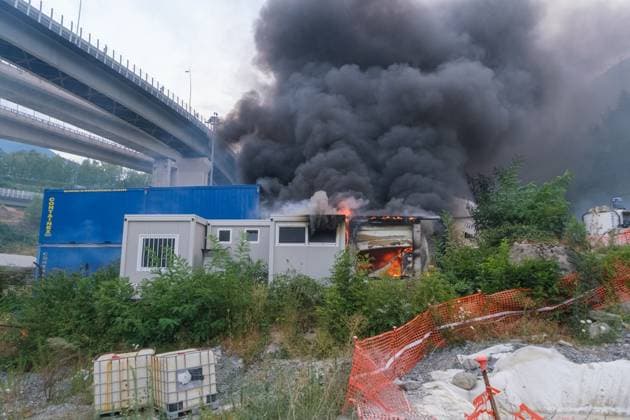 July 25, 2026, Chiomonte, Val Di Susa, Italy: CHIOMONTE, VAL DI SUSA, PIEDMONT, ITALY Ã¢â‚¬ JULY 25, 2026: Masked activists from the No TAV movement, which opposes the Turin-Lyon high-speed railway project, clash with security forces after storming the high-speed rail construction site in Chiomonte. Protesters threw rocks and firecrackers, setting fire to four vehicles belonging to the Carabinieri and Guardia di Finanza. Police responded with tear gas and water cannons, leaving more than 50 security personnel injured and forcing the closure of a section of the A32 Turin-Bardonecchia motorway. Chiomonte, Val Di Susa Italy  - ZUMAq101 20260725_zna_q101_277 Copyright: xLeonardoxGaravagliax