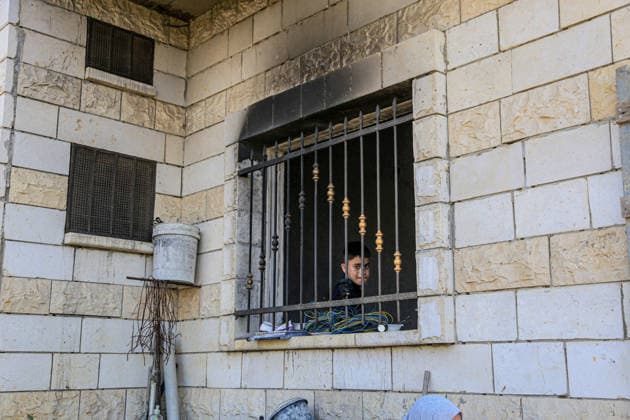 July 25, 2026, Nablus, West Bank, Palestine: Palestinians inspect a burned-out house set on fire by Jewish settlers in the village of Tell, southwest of Nablus in the West Bank. This attack came in retaliation for the killing of two settlers and four Palestinians in Tell, southwest of Nablus in the West Bank. In response, settlers set fire to Palestinian cars and homes in Tell and the neighboring village of Qalqilya Sara. Meanwhile, the Israeli army announced its readiness for a military operation in the northern West Bank, which is under the control of the Palestinian Authority. Nablus Palestine - ZUMAs197 20260725_aaa_s197_268 Copyright: xNasserxishatyehx