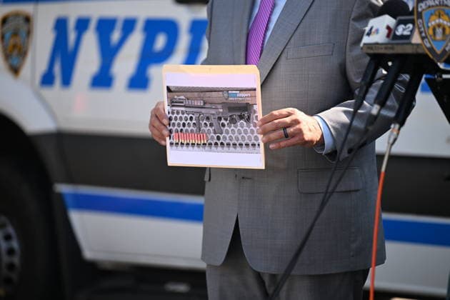 NYPD holds press conference following Queens shooting and house fire NEW YORK, NY, UNITED STATES - JULY 25: NYPD officers hold a press conference after suspect Kegan Thomas allegedly wielded a shotgun and was shot and critically wounded by NYPD officers after two people were found dead and the house was found to be set ablaze in Far Rockaway, Queens, New York, United States on Saturday, July 25, 2026. Saturday afternoon NYPD and FDNY responded to the incident at the home at 25-33 Ocean Crest Boulevard. Inside of the suspects tactical vest, shotgun shells were found when he was taken into custody. Kyle Mazza Anadolu New York United States. Editorial use only. Please get in touch for any other usage.  Copyright: x2026xAnadoluxKylexMazzax
