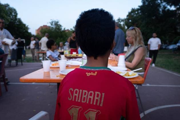July 25, 2026, Bologna, IT: BOLOGNA, ITALY - JULY 25, 2026: Large crowds gather for a dinner and vigil in memory of Abderrahim Fakir at Pilastro Park, Bologna. The neighborhood event was organized by local grassroots committees together with Fakir s family, following days of citywide mobilization to commemorate the 42-year-old Moroccan man who died on July 19 during a police stop. JNA Press Bologna IT - ZUMAq101 20260725_zna_q101_351 Copyright: xThomasxCavagnax