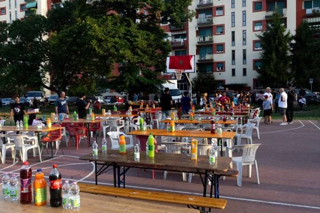 July 25, 2026, Bologna, IT: BOLOGNA, ITALY - JULY 25, 2026: Large crowds gather for a dinner and vigil in memory of Abderrahim Fakir at Pilastro Park, Bologna. The neighborhood event was organized by local grassroots committees together with Fakir s family, following days of citywide mobilization to commemorate the 42-year-old Moroccan man who died on July 19 during a police stop. JNA Press Bologna IT - ZUMAq101 20260725_zna_q101_352 Copyright: xThomasxCavagnax