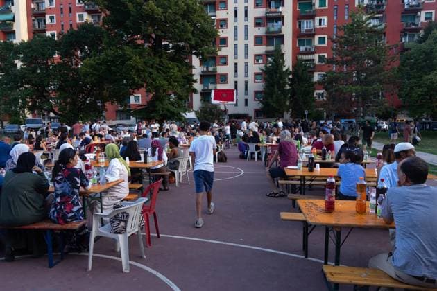 July 25, 2026, Bologna, IT: BOLOGNA, ITALY - JULY 25, 2026: Large crowds gather for a dinner and vigil in memory of Abderrahim Fakir at Pilastro Park, Bologna. The neighborhood event was organized by local grassroots committees together with Fakir s family, following days of citywide mobilization to commemorate the 42-year-old Moroccan man who died on July 19 during a police stop. JNA Press Bologna IT - ZUMAq101 20260725_zna_q101_353 Copyright: xThomasxCavagnax