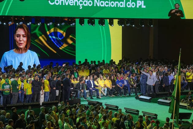 July 25, 2026: Politician Flavio Bolsonaro looks at a remote video message from Michelle Bolsonaro, Jair BolsonaroÃ¢â‚¬â ¢s wife, speaking to the national assembly of the Liberal Party (PL), the country s main rightist movement. - ZUMAl146 20260725_aaf_l146_004 Copyright: xPauloxLopesx
