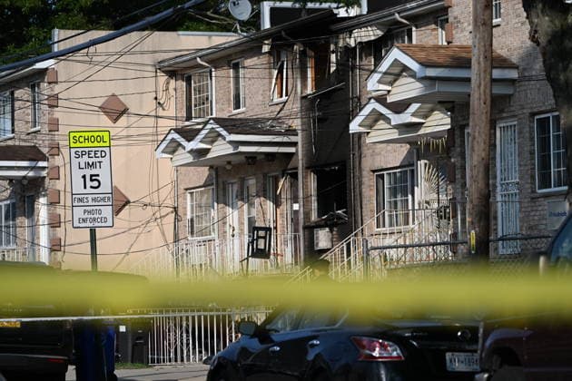 Police shoot armed suspect in Queens after house fire NEW YORK, NY, UNITED STATES - JULY 25: NYPD officers work the scene where a suspect wielding a shotgun was shot and critically wounded by NYPD officers after two people were found dead and the house was found to be set ablaze in Far Rockaway, Queens, New York, United States on Saturday, July 25, 2026. Saturday afternoon NYPD and FDNY responded to the incident at the home on 25-33 Ocean Crest Boulevard. Inside of the suspects tactical vest, shotgun shells were found when he was taken into custody. Kyle Mazza Anadolu New York United States. Editorial use only. Please get in touch for any other usage.  Copyright: x2026xAnadoluxKylexMazzax