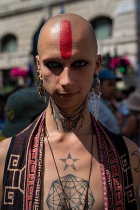 July 25, 2026, London, Westminster, United Kingdom: An activist looks on during the Trans+ Pride London march. Thousands of people joined the seventh annual Trans+ Pride march and rally in central London. The event celebrated the trans community while promoting equality and challenging discrimination through visibility and collective action. The march set off from Langham Place at 2 p.m., paused at three points for speeches and to welcome additional participants, and concluded with a rally and further speeches in Trafalgar Square. London United Kingdom - ZUMAs197 20260725_aaa_s197_293 Copyright: xJamesxWilloughbyx