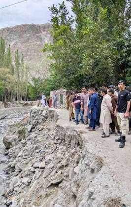 July 25, 2026, Peshawar, Peshawar, Pakistan: Flash Floods and Glacier Outburst Floods Cut Off Parts of Gilgit-Baltistan for Fourth Day...GILGIT, Pakistan Torrential rains, flash floods and glacial lake outburst floods (GLOFs) continued to isolate several parts of Pakistan s Gilgit-Baltistan region for a fourth consecutive day, with thousands of residents and tourists stranded as key roads remained blocked. Authorities said rapid glacier melting, driven by unusually high temperatures, caused widespread damage to highways, disrupted relief operations and cut access to remote valleys. Emergency teams are working around the clock to restore road links, while helicopter rescue operations have been ordered for inaccessible areas. The Pakistan Met - ZUMAa217 20260725_znp_a217_012 Copyright: xHussainxAlix