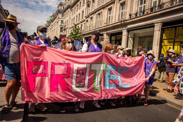July 25, 2026, London, United Kingdom: Protestors march with a large banner during the London Trans+ Pride 2026 Parade. New EHRC rules limiting single-sex spaces to biological sex created a bleak backdrop for this year s London Trans+ Pride march. London United Kingdom - ZUMAs197 20260725_aaa_s197_311 Copyright: xLoredanaxSangiulianox