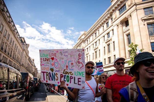 July 25, 2026, London, United Kingdom: A protestor holds a placard during the London Trans+ Pride 2026 Parade. New EHRC rules limiting single-sex spaces to biological sex created a bleak backdrop for this year s London Trans+ Pride march. London United Kingdom - ZUMAs197 20260725_aaa_s197_317 Copyright: xLoredanaxSangiulianox