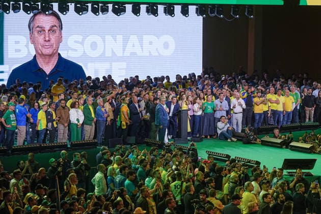July 25, 2026: Senator Flavio Bolsonaro observes a digital AI video engineered to simulate a political statement from his father, former President Jair Bolsonaro, who remains under house arrest, at the Liberal Party (PL) event in Sao Paulo, Brazil. The premier conservative alliance validated the presidential run of the former leader s firstborn son. - ZUMAl146 20260725_aaf_l146_020 Copyright: xPauloxLopesx