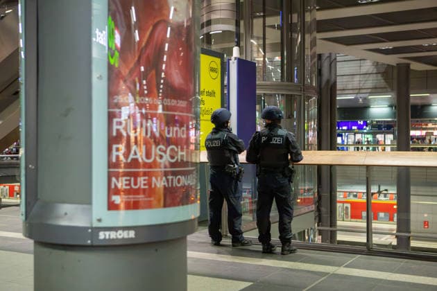 July 25, 2026, Berlin, Berlin: Police officers patrol inside Berlin Central Station after the car attack at CSD Berlin. The incident prompted an increased security presence at major public transport locations as authorities monitored the situation and reassured travelers. Berlin INT  - ZUMAc291 20260725_zip_c291_001 Copyright: xMariaxCastrox
