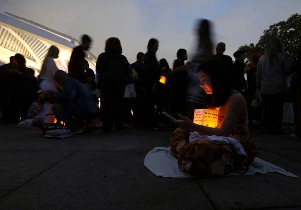 July 25, 2026, Rio De Janeiro, Rio De Janeiro, Brazil: Hundreds came to the inaugural Water Lantern Festival at the Museum of Tomorrow (Museu do AmanhoÂ£) in Rio de Janeiro, Brazil to release illuminated water lanterns fitted with small LED lights. Participants personalized the floating lanterns with messages before setting them on the water at sunset, creating a display intended to symbolize hope, healing, remembrance and unity. The festival, which is held annually in dozens of cities around the world, including New York, Los Angeles, Toronto, London and Sydney, made its Brazil debut in Rio de Janeiro. Rio De Janeiro Brazil - ZUMAk251 20260725_znp_k251_004 Copyright: xBobxKarpx