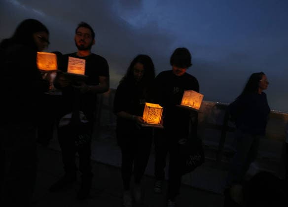July 25, 2026, Rio De Janeiro, Rio De Janeiro, Brazil: Hundreds came to the inaugural Water Lantern Festival at the Museum of Tomorrow (Museu do AmanhoÂ£) in Rio de Janeiro, Brazil to release illuminated water lanterns fitted with small LED lights. Participants personalized the floating lanterns with messages before setting them on the water at sunset, creating a display intended to symbolize hope, healing, remembrance and unity. The festival, which is held annually in dozens of cities around the world, including New York, Los Angeles, Toronto, London and Sydney, made its Brazil debut in Rio de Janeiro. Rio De Janeiro Brazil - ZUMAk251 20260725_znp_k251_015 Copyright: xBobxKarpx