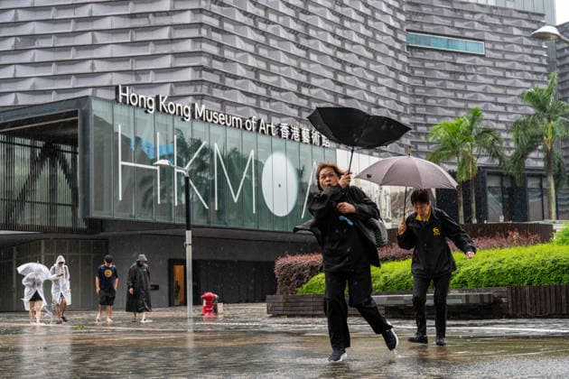 HONGKONG-TYPHOON NOUL People reacts to winds during typhoon Noul in Hong Kong, July 26, 2026. NEXPHER Vernon Yuen HONG KONG