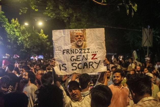 July 25, 2026, New Delhi, India: NEW DELHI, INDIA Ã¢â‚¬ JULY 25, 2026: Student protesters celebrate at Jantar Mantar following the resignation of India s Union Education Minister Dharmendra Pradhan, in New Delhi, India. Demonstrators hold placards reading Jeet ( Victory ), wave the Indian national flag and climb police barricades after the announcement, following days of nationwide protests over alleged irregularities in the country s education system. New Delhi India - ZUMAq101 20260725_zna_q101_365 Copyright: xAmitxShuklax