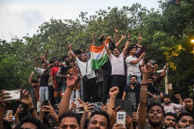 July 25, 2026, New Delhi, India: NEW DELHI, INDIA Ã¢â‚¬ JULY 25, 2026: Student protesters celebrate at Jantar Mantar following the resignation of India s Union Education Minister Dharmendra Pradhan, in New Delhi, India. Demonstrators hold placards reading Jeet ( Victory ), wave the Indian national flag and climb police barricades after the announcement, following days of nationwide protests over alleged irregularities in the country s education system. New Delhi India - ZUMAq101 20260725_zna_q101_362 Copyright: xAmitxShuklax