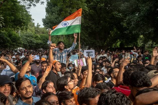July 25, 2026, New Delhi, India: NEW DELHI, INDIA Ã¢â‚¬ JULY 25, 2026: Student protesters celebrate at Jantar Mantar following the resignation of India s Union Education Minister Dharmendra Pradhan, in New Delhi, India. Demonstrators hold placards reading Jeet ( Victory ), wave the Indian national flag and climb police barricades after the announcement, following days of nationwide protests over alleged irregularities in the country s education system. New Delhi India - ZUMAq101 20260725_zna_q101_363 Copyright: xAmitxShuklax