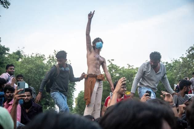 July 25, 2026, New Delhi, India: NEW DELHI, INDIA Ã¢â‚¬ JULY 25, 2026: Student protesters celebrate at Jantar Mantar following the resignation of India s Union Education Minister Dharmendra Pradhan, in New Delhi, India. Demonstrators hold placards reading Jeet ( Victory ), wave the Indian national flag and climb police barricades after the announcement, following days of nationwide protests over alleged irregularities in the country s education system. New Delhi India - ZUMAq101 20260725_zna_q101_374 Copyright: xAmitxShuklax