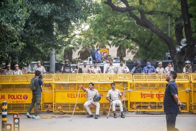 July 25, 2026, New Delhi, India: NEW DELHI, INDIA Ã¢â‚¬ JULY 25, 2026: Student protesters celebrate at Jantar Mantar following the resignation of India s Union Education Minister Dharmendra Pradhan, in New Delhi, India. Demonstrators hold placards reading Jeet ( Victory ), wave the Indian national flag and climb police barricades after the announcement, following days of nationwide protests over alleged irregularities in the country s education system. New Delhi India - ZUMAq101 20260725_zna_q101_375 Copyright: xAmitxShuklax
