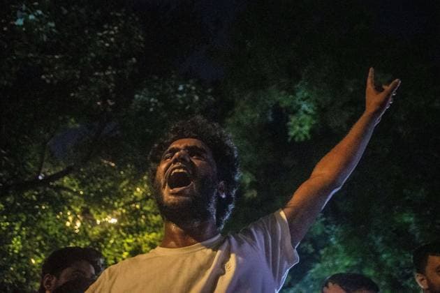 July 25, 2026, New Delhi, India: NEW DELHI, INDIA Ã¢â‚¬ JULY 25, 2026: Student protesters celebrate at Jantar Mantar following the resignation of India s Union Education Minister Dharmendra Pradhan, in New Delhi, India. Demonstrators hold placards reading Jeet ( Victory ), wave the Indian national flag and climb police barricades after the announcement, following days of nationwide protests over alleged irregularities in the country s education system. New Delhi India - ZUMAq101 20260725_zna_q101_376 Copyright: xAmitxShuklax