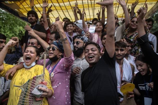 July 25, 2026, New Delhi, India: NEW DELHI, INDIA Ã¢â‚¬ JULY 25, 2026: Student protesters celebrate at Jantar Mantar following the resignation of India s Union Education Minister Dharmendra Pradhan, in New Delhi, India. Demonstrators hold placards reading Jeet ( Victory ), wave the Indian national flag and climb police barricades after the announcement, following days of nationwide protests over alleged irregularities in the country s education system. New Delhi India - ZUMAq101 20260725_zna_q101_379 Copyright: xAmitxShuklax