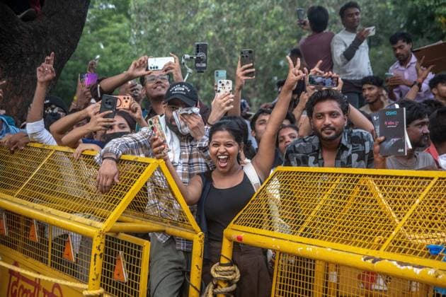 July 25, 2026, New Delhi, India: NEW DELHI, INDIA Ã¢â‚¬ JULY 25, 2026: Student protesters celebrate at Jantar Mantar following the resignation of India s Union Education Minister Dharmendra Pradhan, in New Delhi, India. Demonstrators hold placards reading Jeet ( Victory ), wave the Indian national flag and climb police barricades after the announcement, following days of nationwide protests over alleged irregularities in the country s education system. New Delhi India - ZUMAq101 20260725_zna_q101_386 Copyright: xAmitxShuklax