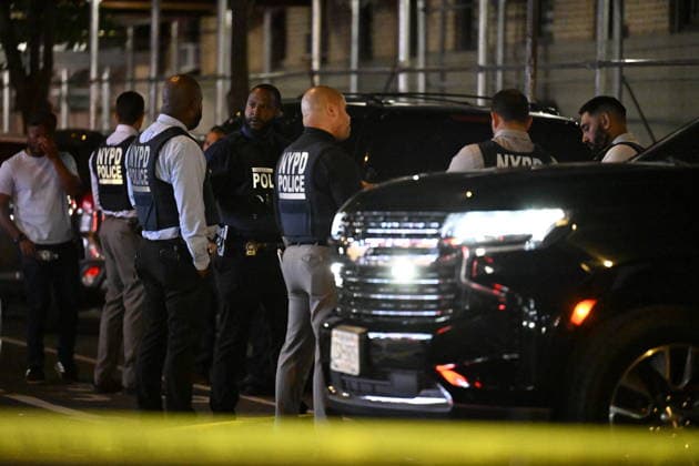 12-year-old boy killed, two men injured in Bronx shooting BRONX, NEW YORK, UNITED STATES - JULY 25: NYPD officers work the scene where a 12-year-old boy was killed and two men were injured in a shooting outside of a Supermarket and Deli at 104 Elliot Place in Bronx, New York, United States on July 25, 2026. Saturday afternoon at approximately 4:55 pm the shooting took place. A 12-year-old boy was shot to the shoulder and taken to Lincoln Hospital where he was pronounced dead. A 25-year-old man was shot to the buttocks and a 34-year-old man was shot to the foot. Both men are listed in stable condition at the hospital. There are no arrests, the identity of the deceased is pending proper family notification and the investigation is ongoing by  Copyright: x2026xAnadoluxKylexMazzax