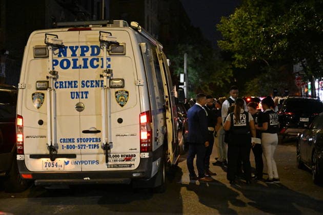 12-year-old boy killed, two men injured in Bronx shooting BRONX, NEW YORK, UNITED STATES - JULY 25: NYPD officers work the scene where a 12-year-old boy was killed and two men were injured in a shooting outside of a Supermarket and Deli at 104 Elliot Place in Bronx, New York, United States on July 25, 2026. Saturday afternoon at approximately 4:55 pm the shooting took place. A 12-year-old boy was shot to the shoulder and taken to Lincoln Hospital where he was pronounced dead. A 25-year-old man was shot to the buttocks and a 34-year-old man was shot to the foot. Both men are listed in stable condition at the hospital. There are no arrests, the identity of the deceased is pending proper family notification and the investigation is ongoing by  Copyright: x2026xAnadoluxKylexMazzax