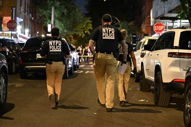 12-year-old boy killed, two men injured in Bronx shooting BRONX, NEW YORK, UNITED STATES - JULY 25: NYPD officers work the scene where a 12-year-old boy was killed and two men were injured in a shooting outside of a Supermarket and Deli at 104 Elliot Place in Bronx, New York, United States on July 25, 2026. Saturday afternoon at approximately 4:55 pm the shooting took place. A 12-year-old boy was shot to the shoulder and taken to Lincoln Hospital where he was pronounced dead. A 25-year-old man was shot to the buttocks and a 34-year-old man was shot to the foot. Both men are listed in stable condition at the hospital. There are no arrests, the identity of the deceased is pending proper family notification and the investigation is ongoing by  Copyright: x2026xAnadoluxKylexMazzax