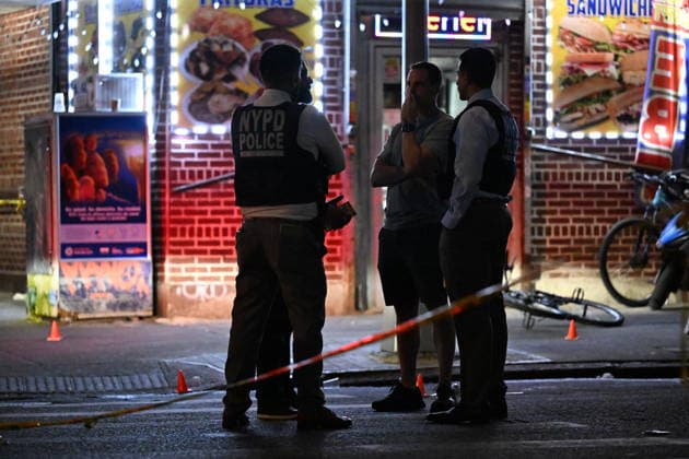 12-year-old boy killed, two men injured in Bronx shooting BRONX, NEW YORK, UNITED STATES - JULY 25: NYPD officers work the scene where a 12-year-old boy was killed and two men were injured in a shooting outside of a Supermarket and Deli at 104 Elliot Place in Bronx, New York, United States on July 25, 2026. Saturday afternoon at approximately 4:55 pm the shooting took place. A 12-year-old boy was shot to the shoulder and taken to Lincoln Hospital where he was pronounced dead. A 25-year-old man was shot to the buttocks and a 34-year-old man was shot to the foot. Both men are listed in stable condition at the hospital. There are no arrests, the identity of the deceased is pending proper family notification and the investigation is ongoing by  Copyright: x2026xAnadoluxKylexMazzax