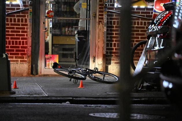 12-year-old boy killed, two men injured in Bronx shooting BRONX, NEW YORK, UNITED STATES - JULY 25: NYPD officers work the scene where a 12-year-old boy was killed and two men were injured in a shooting outside of a Supermarket and Deli at 104 Elliot Place in Bronx, New York, United States on July 25, 2026. Saturday afternoon at approximately 4:55 pm the shooting took place. A 12-year-old boy was shot to the shoulder and taken to Lincoln Hospital where he was pronounced dead. A 25-year-old man was shot to the buttocks and a 34-year-old man was shot to the foot. Both men are listed in stable condition at the hospital. There are no arrests, the identity of the deceased is pending proper family notification and the investigation is ongoing by  Copyright: x2026xAnadoluxKylexMazzax